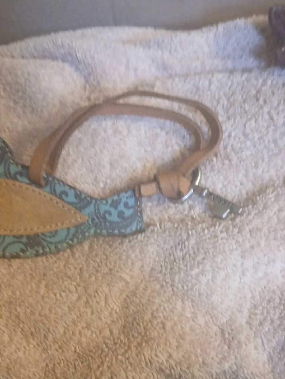 Fossil blue paisley leather bird keychain bag charm featuring a silver-toned key